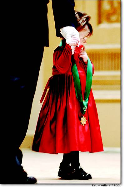 A Medal for Mommy Two-year-old Patricia Smith holds her father's gloved hand Dec. 4 after accepting the New York Police Department's highest honor, the Medal of Honor, on behalf of her late mother, Officer Moira Smith, who died in the World Trade Center attacks. Patricia's father is also a police officer.