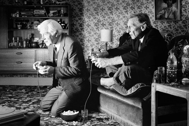 Gamers Old men playing modern video game.