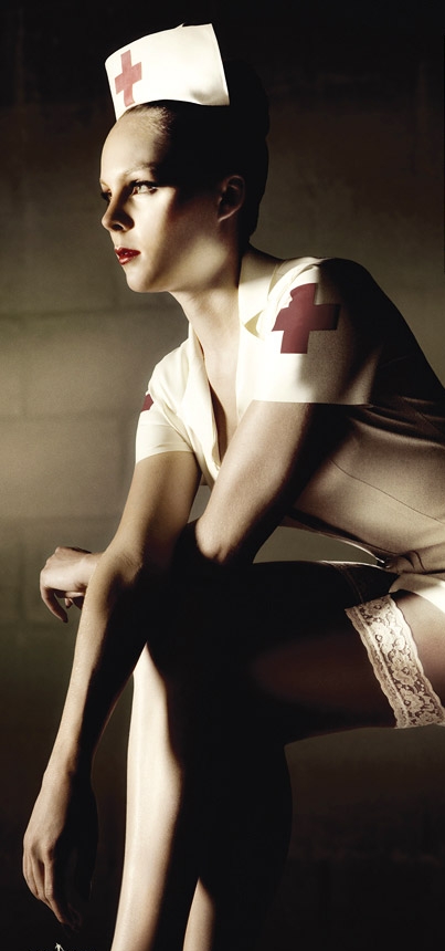 Red Cross Nurse Picture of Red Cross nurse in an old-fashioned uniform, in color, but with sepia tone coloring.