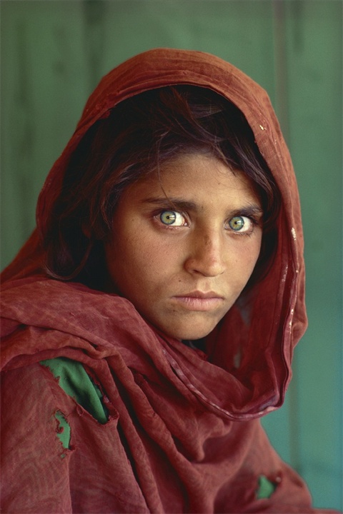 Afghan Girl Picture of a pretty girl with haunting green eyes.