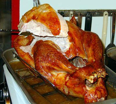 Removing breast half.