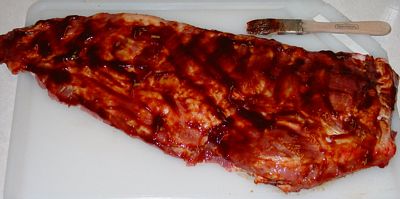 Uncooked Spareribs with barbecue sauce on them. Uncooked Spareribs with BBQ sauce on them.