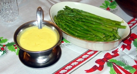 Asparagus with hollandaise sauce on the side Asparagus with hollandaise sauce on the side
