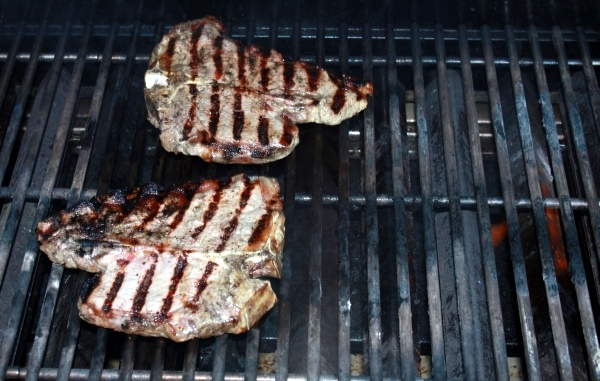 Steaks Cooking on the Grill Steaks Cooking on the Grill